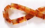 Light Bright Carnelian Pillow Bead Strand - for confidence!