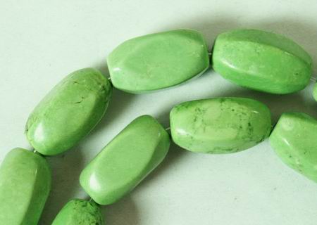 Faceted Gaspeite Barrel Bead Strand