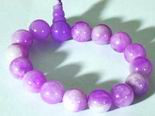 Seductive 12mm Lavender Jade Bead Bracelet