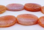 Gleaming Peach Fire Agate Oval Beads - Large