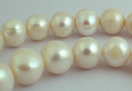 34 Colossal 14mm White Pearls - heavy & very little grooving