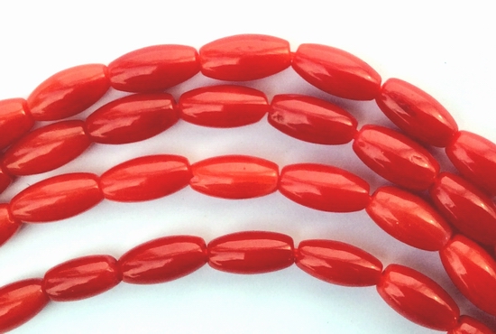 65 Red Coral Rice Beads - 6mm x 3mm