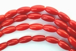 65 Red Coral Rice Beads - 6mm x 3mm