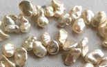 70 Large Gleaming Silvery-White Keshi Pearls