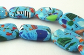 Light Blue Picasso Calsilica Pillow Beads